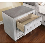 Gray FOA West Alzir nightstand with a sleek modern design and a single drawer, shown in a well-lit bedroom setting