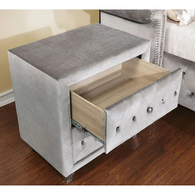 Gray FOA West Alzir nightstand with a sleek modern design and a single drawer, shown in a well-lit bedroom setting