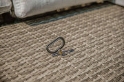FOA West Antigua outdoor sofa with plush cushions, stylish modern seating for outdoor patio or garden spaces.