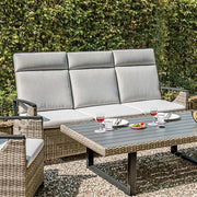FOA West Antigua outdoor sofa with cushioned seating and wooden frame, ideal for patio or garden relaxation.